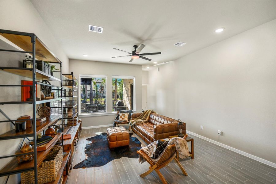 Furnished interior view inside a new home in The Highlands - Grove Collection, Porter (Image 18).