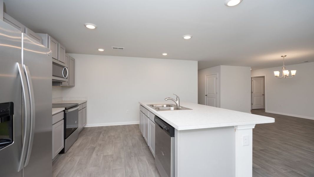 Representative furnished interior of a home built from the KERRY by D.R. Horton in Stanbury Creek, Supply (Image 8).