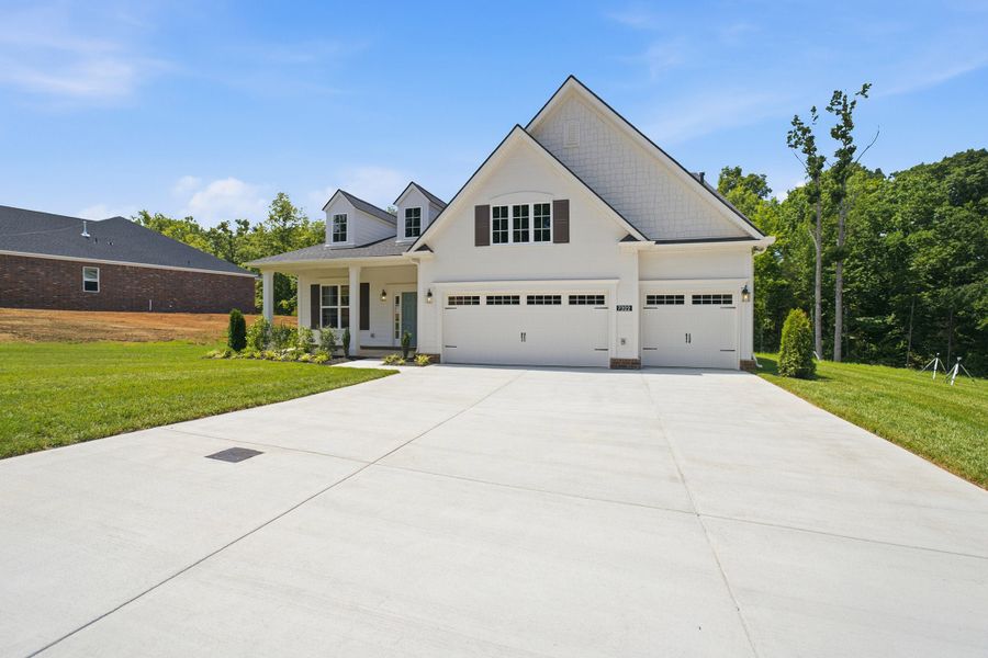 Front exterior of a new home in Aden Woods, Fairview, TN, highlighting curb appeal (Image 29).