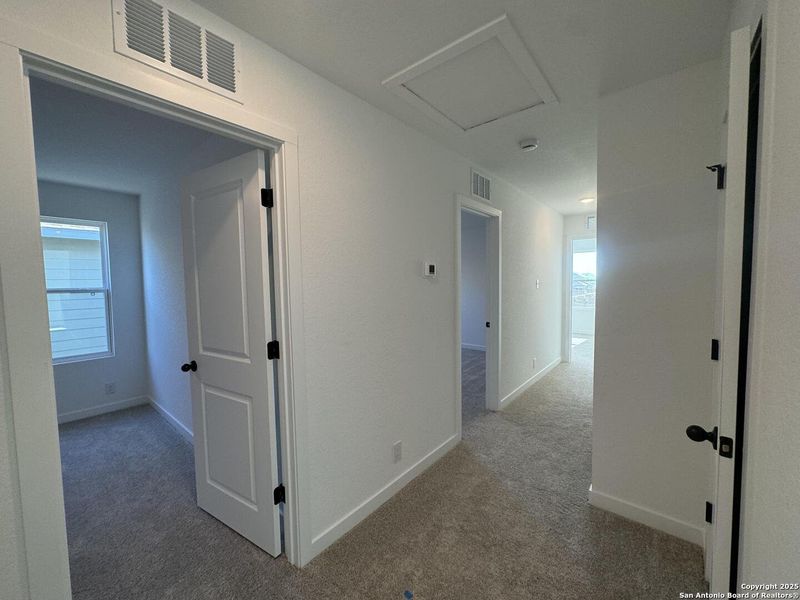 Spacious, unfurnished interior of a new home in Enclave at Hennersby Hollow 50's, San Antonio (Image 17).