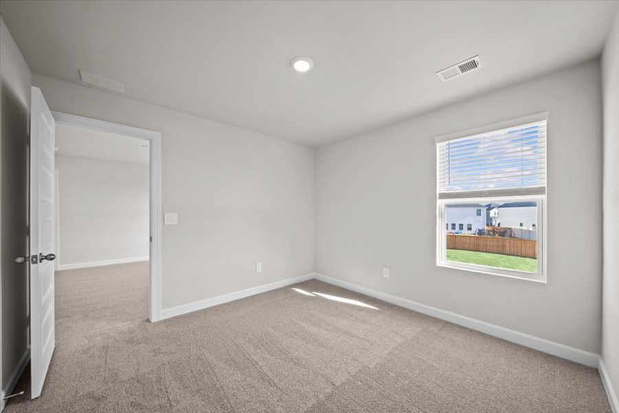 Spacious, unfurnished interior of a new home in Brayfield Manor - Signature Collection, Wellford (Image 18).