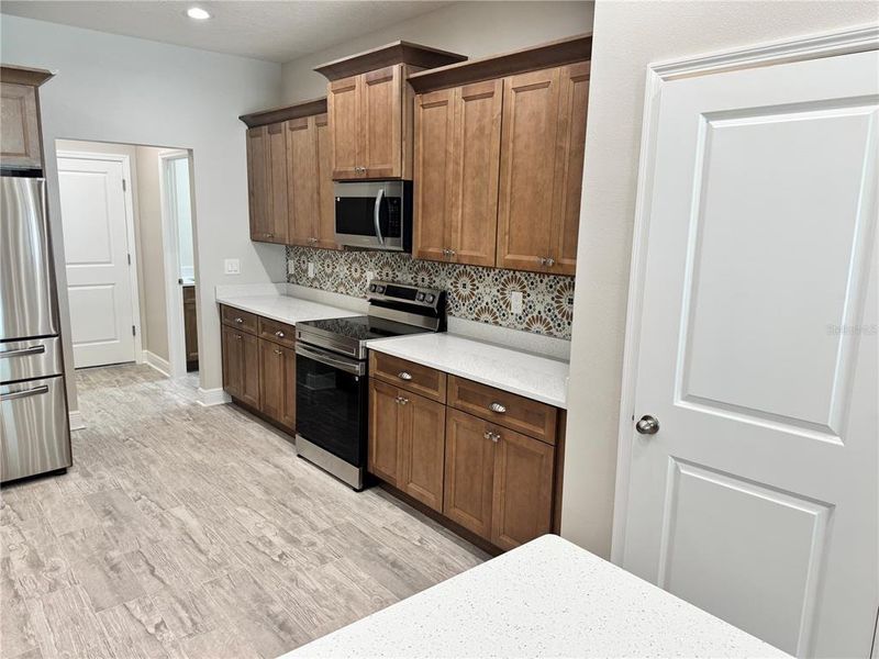 Furnished interior view inside a new home in , Dade City (Image 36).