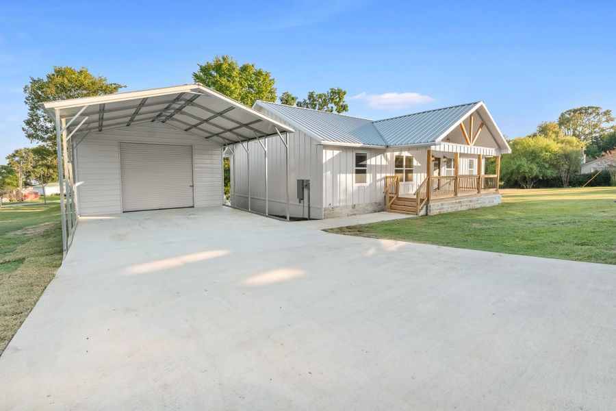 Exterior details and patio area of a home in , Point Blank (Image 27).