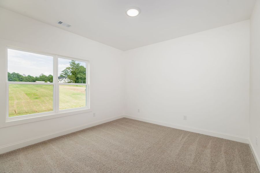 Spacious, unfurnished interior of a new home in The Reserve at Reidsboro, Williamson (Image 47).