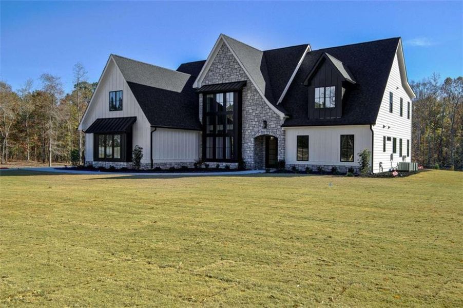 Front exterior of a new home in , Brooks, GA, highlighting curb appeal (Image 27).