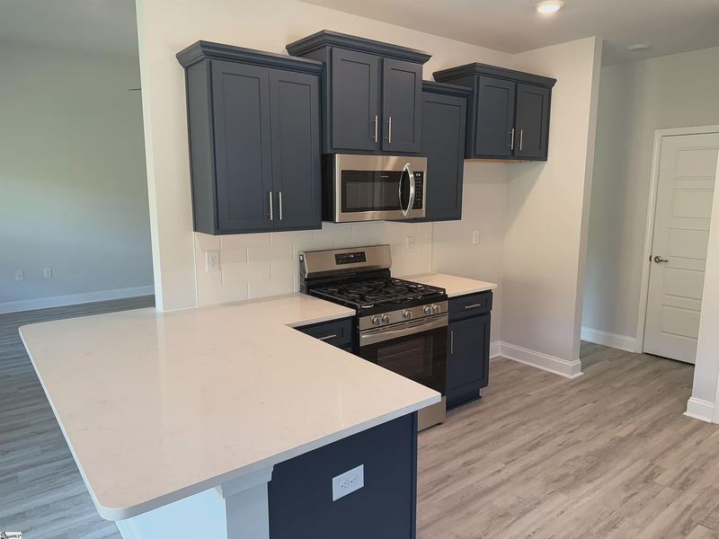 Furnished interior view inside a new home in Bracken Woods, Piedmont (Image 6).