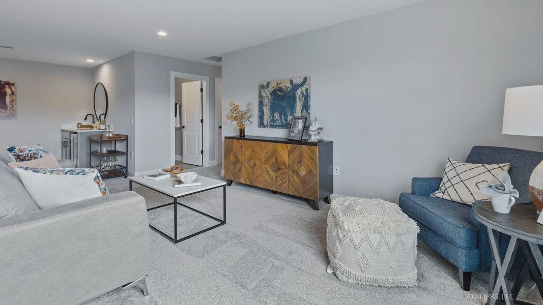 Representative furnished interior of a home built from the Cambridge by Epcon Communities in The Courtyards at Oak Grove, Durham (Image 30).