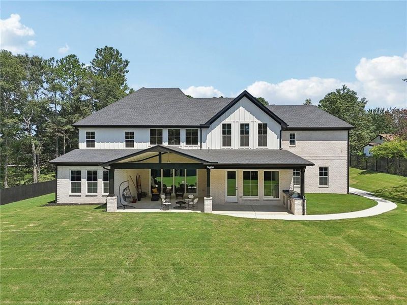 Front exterior of a new home in , Hoschton, GA, highlighting curb appeal (Image 36). Front exterior of a new home in , Hoschton, GA, highlighting curb appeal (Image 36).