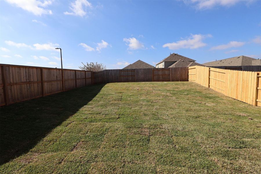 Exterior details and patio area of a home in Lone Star Landing, Montgomery (Image 3).
