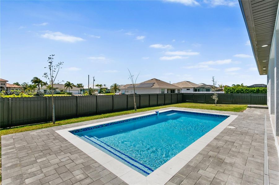Enjoy a beautifully designed pool area perfect for relaxing or entertaining year-round. Enjoy a beautifully designed pool area perfect for relaxing or entertaining year-round.