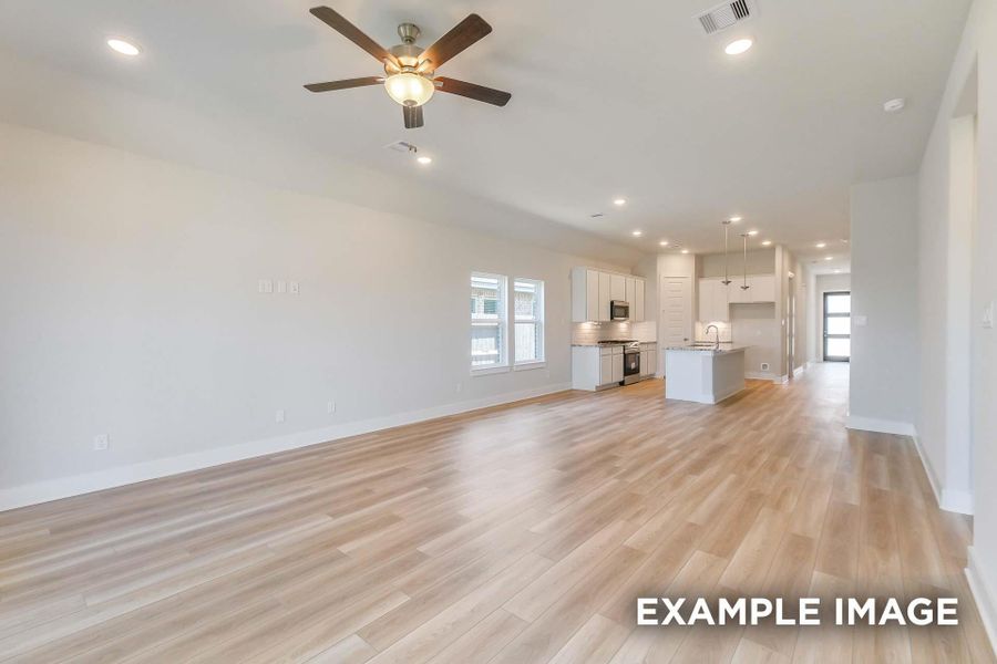 Spacious, unfurnished interior of a new home in Sunterra, Katy (Image 16).