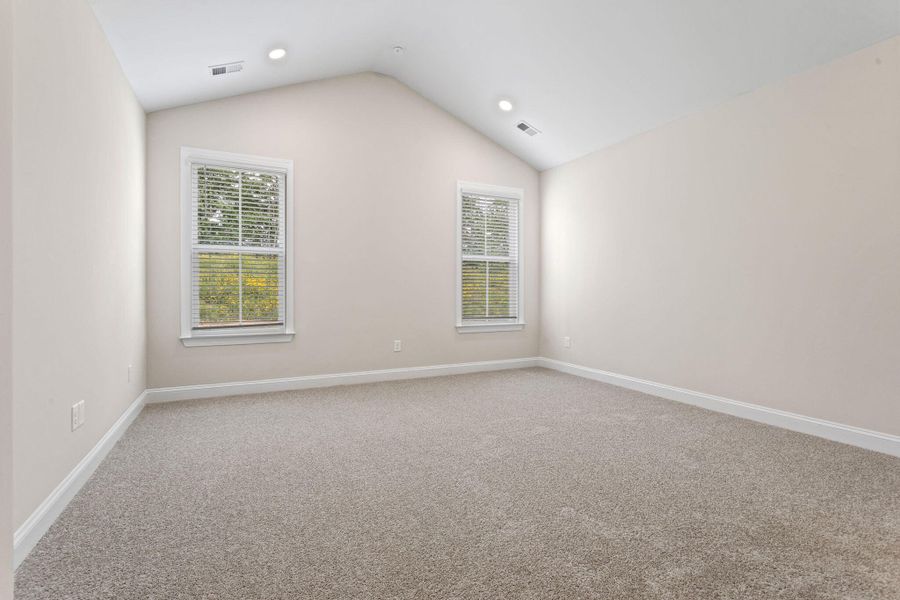 Spacious, unfurnished interior of a new home in Tidewater at Lakes of Cane Bay, Summerville (Image 16).