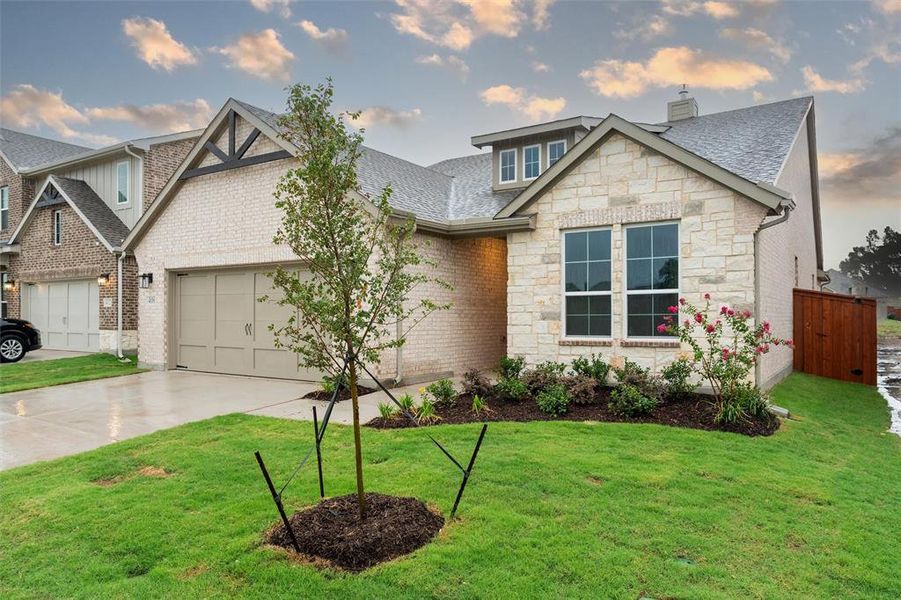 Craftsman house featuring stone siding, an attached garage, a shingled roof, and a front yard Craftsman house featuring stone siding, an attached garage, a shingled roof, and a front yard