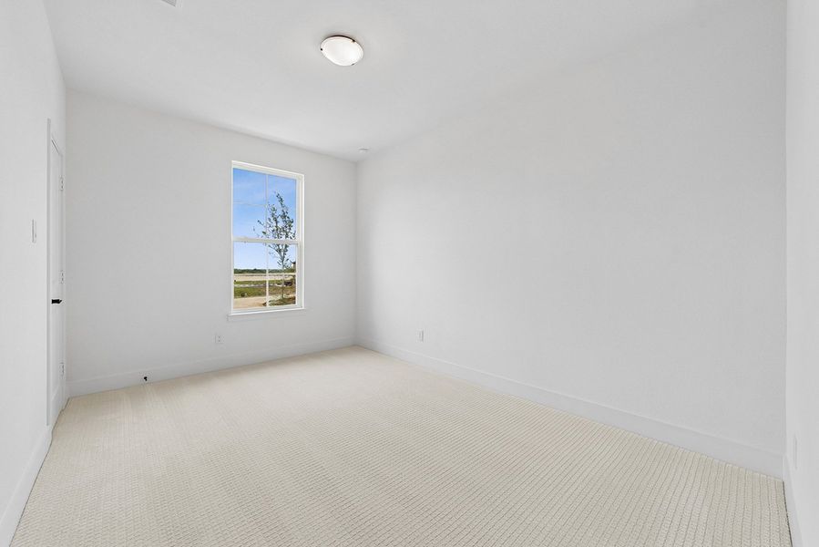 Representative unfurnished interior of a home built from the Ellis by Landon Homes in Fields - East Village, Frisco (Image 19).