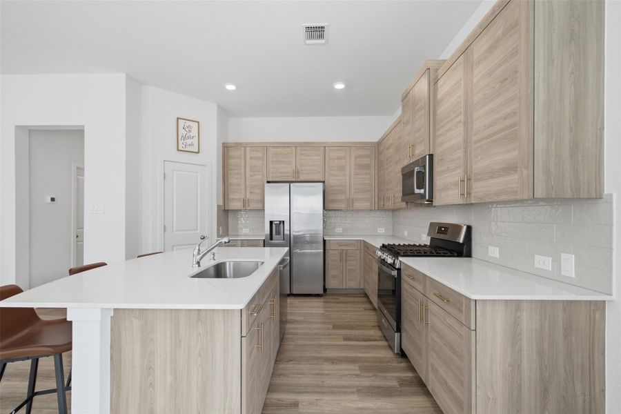 Furnished interior view inside a new home in , Manor (Image 9).