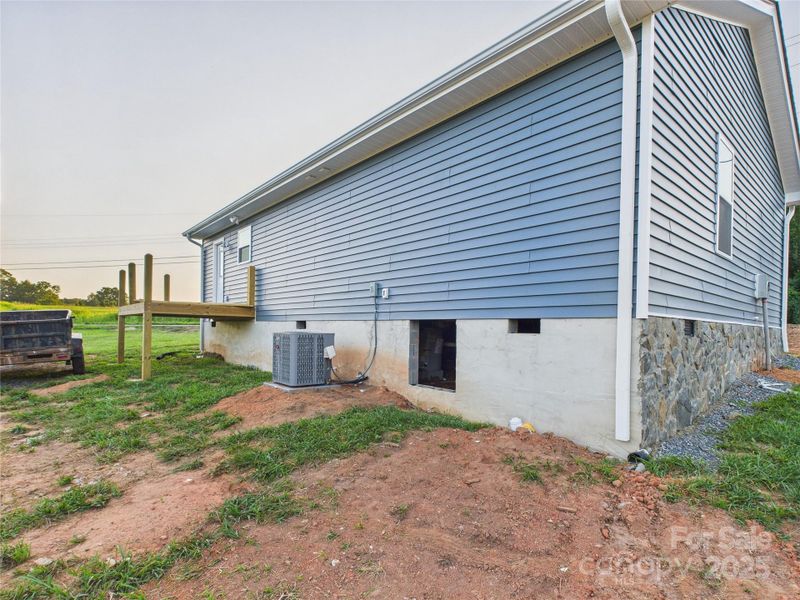 Exterior details and patio area of a home in , Hudson (Image 7). Exterior details and patio area of a home in , Hudson (Image 7).
