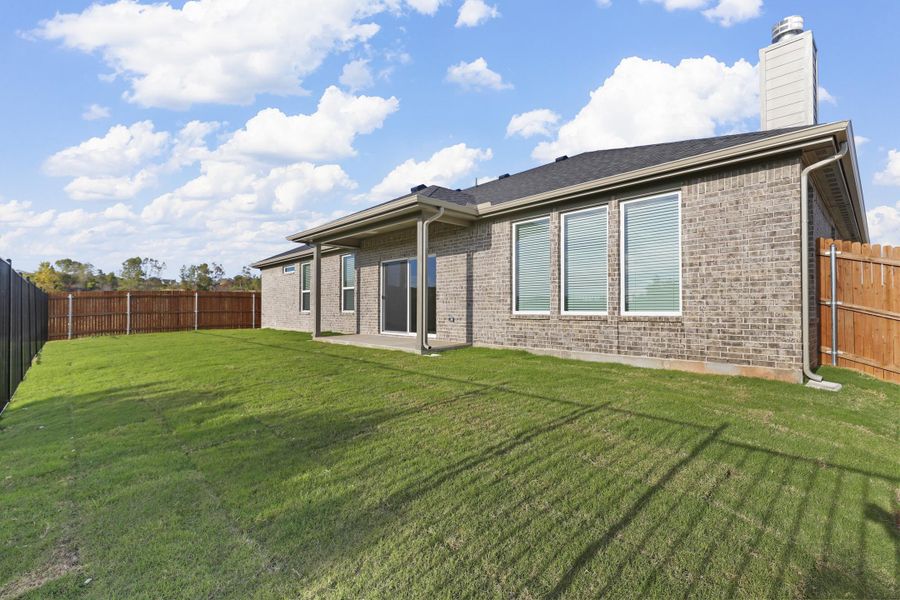 Representative exterior photo of a completed home built from the Garrison I by Cheldan Homes in Stoneview, Glen Rose, TX (Image 30).