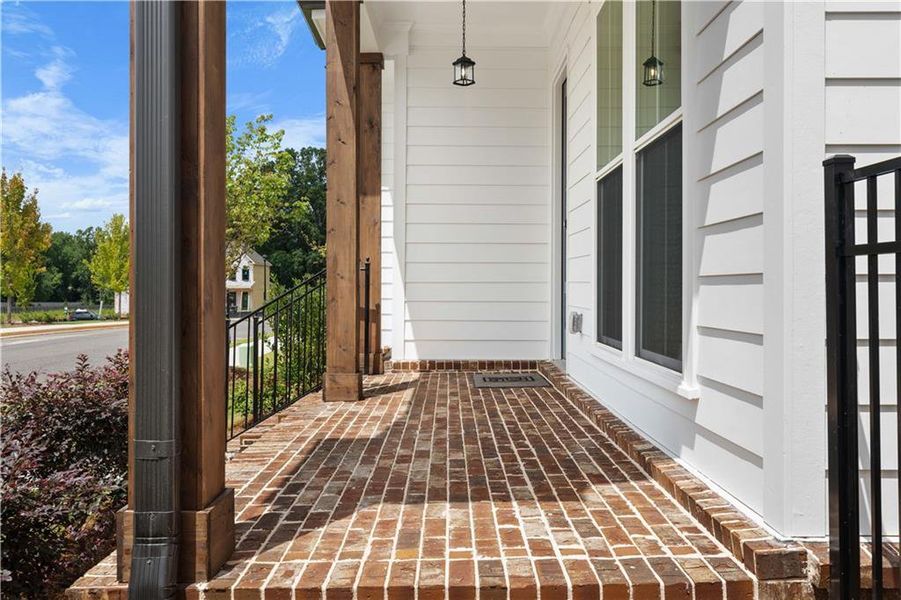 Exterior details and patio area of a home in Promenade at Sawnee Village, Cumming (Image 4).