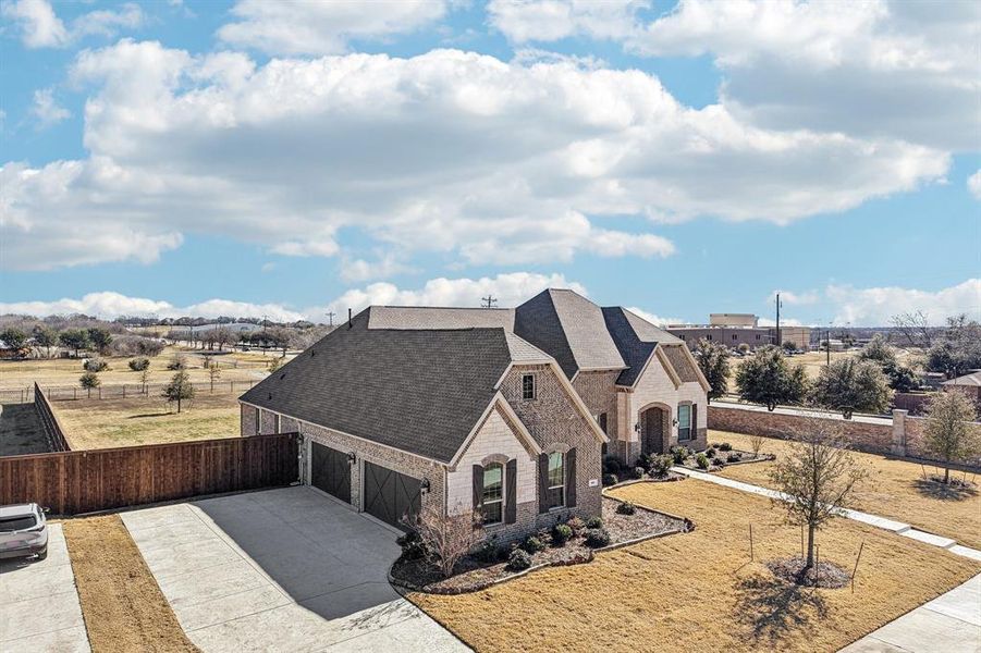 Front exterior of a new home in Gean Estates, Keller, TX, highlighting curb appeal (Image 15).