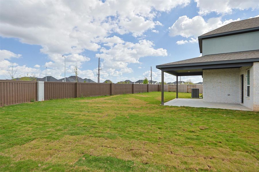Exterior details and patio area of a home in Brookewater, Rosenberg (Image 3).