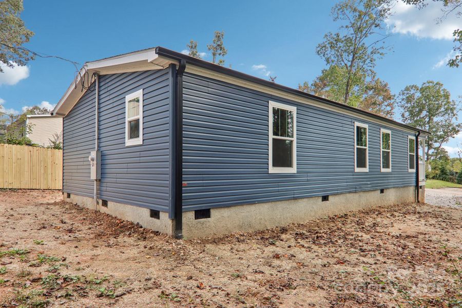 Exterior details and patio area of a home in , Asheville (Image 16). Exterior details and patio area of a home in , Asheville (Image 16).