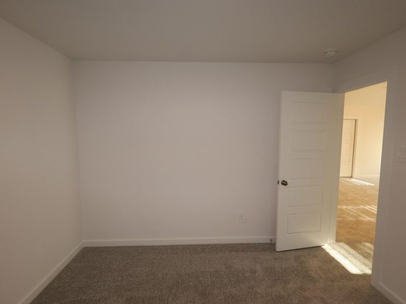 Spacious, unfurnished interior of a new home in Pinewood at Grand Texas, New Caney (Image 24).