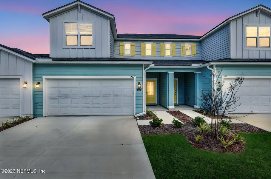 Front exterior of a new home in The Hammock at Palm Harbor, Palm Coast, FL, highlighting curb appeal (Image 21).