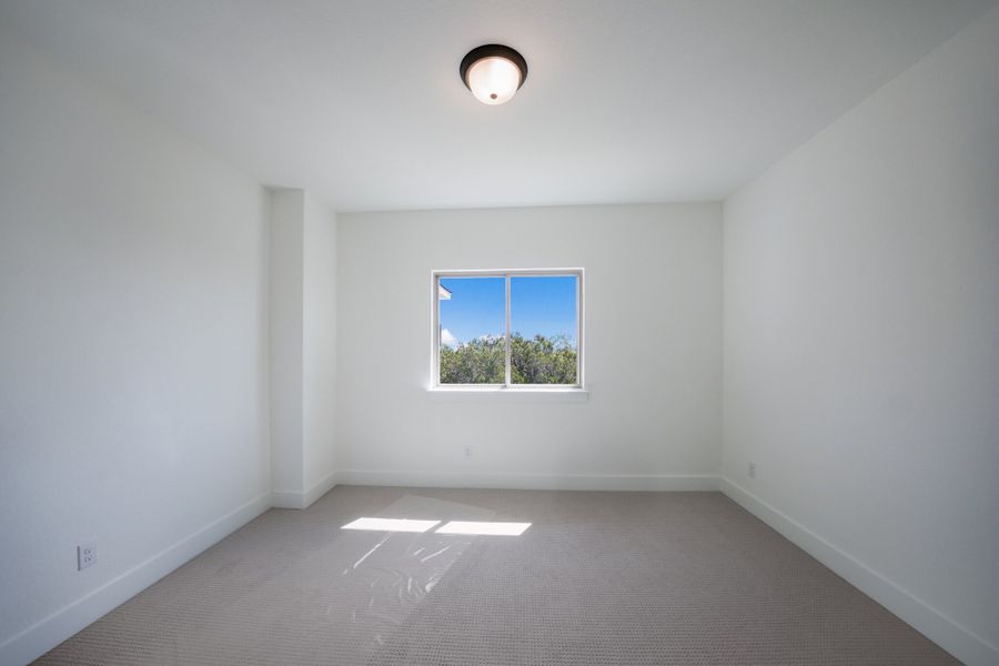 Representative unfurnished interior of a home built from the The Travis by Whitestone Custom Homes in Johnson Ranch, Bulverde (Image 58).