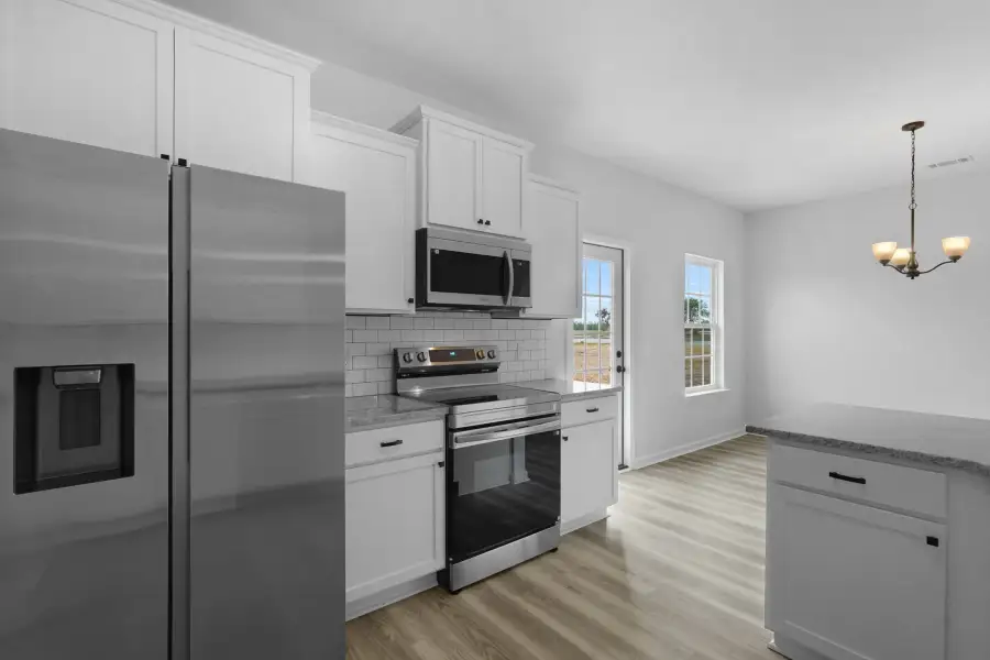 Representative furnished interior of a home built from the The Stafford by RTS Homes in Lakeside at Fifteen West, Hinesville (Image 9).