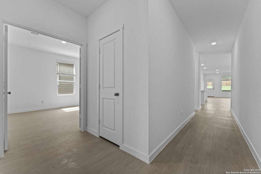Spacious, unfurnished interior of a new home in Waterwheel: Coastline Collection, San Antonio (Image 21).