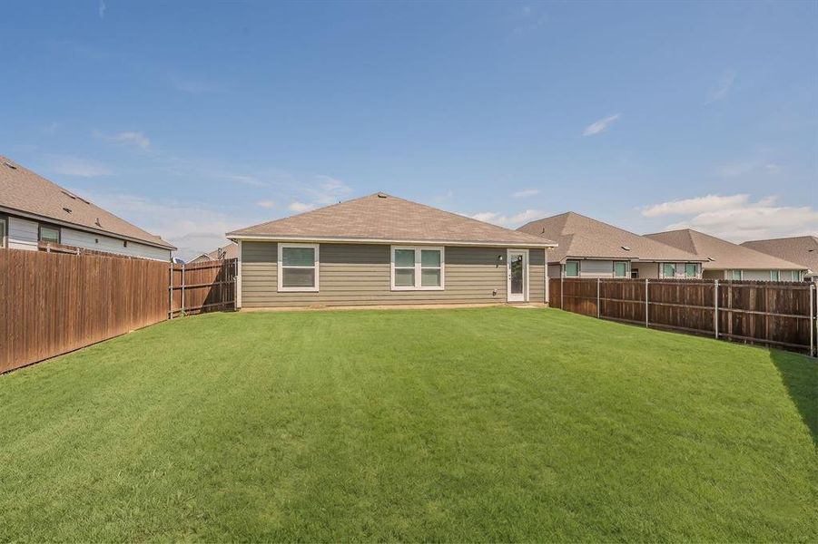 Exterior details and patio area of a home in Craftsman’s Corner, Cleburne (Image 23).