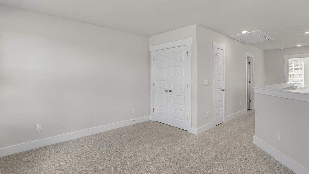 Spacious, unfurnished interior of a new home in The Palms at Indigo Preserve Townhomes, Leland (Image 31). Spacious, unfurnished interior of a new home in The Palms at Indigo Preserve Townhomes, Leland (Image 31).