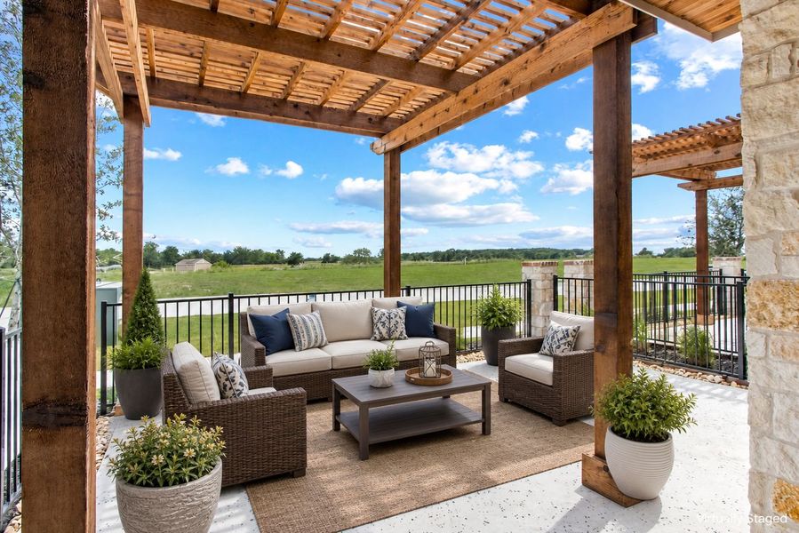 Exterior details and patio area of a home in The Tribute, The Colony (Image 28).