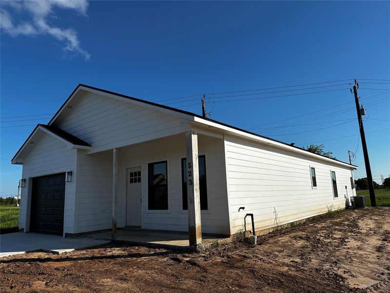 Front exterior of a new home in , Freeport, TX, highlighting curb appeal (Image 19). Front exterior of a new home in , Freeport, TX, highlighting curb appeal (Image 19).