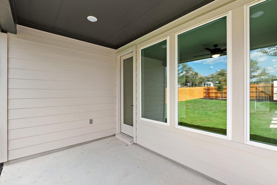 Exterior details and patio area of a home in Terrace Collection at Heritage, Dripping Springs (Image 21). Exterior details and patio area of a home in Terrace Collection at Heritage, Dripping Springs (Image 21).