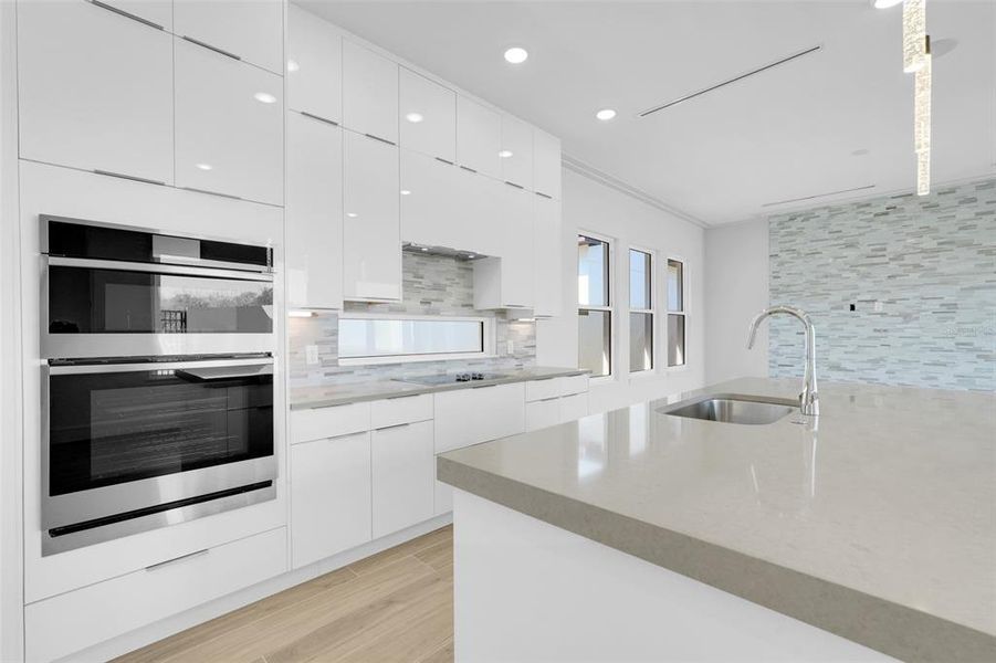 Furnished interior view inside a new home in Hampton Green at Providence, Davenport (Image 7).