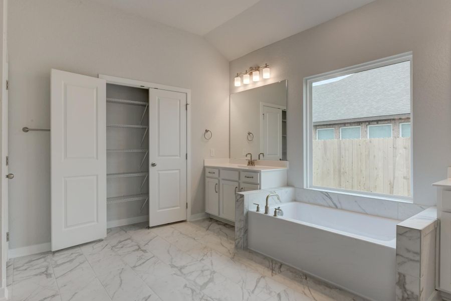 Representative furnished interior of a home built from the Guadalupe by Ashton Woods in The Heritage at Saddlebrook Ranch 70's, Schertz (Image 8).