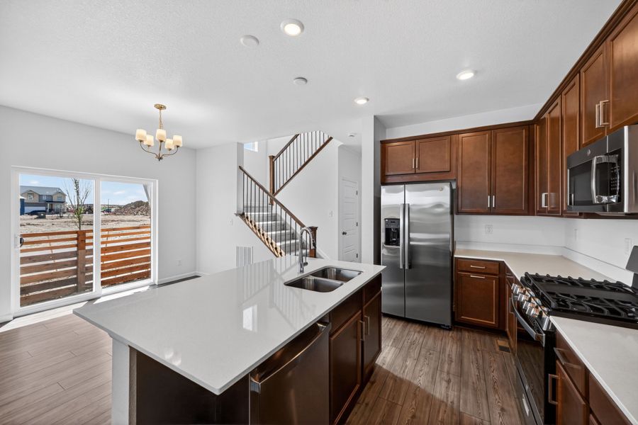 Furnished interior view inside a new home in The Aurora Highlands, Aurora (Image 6).