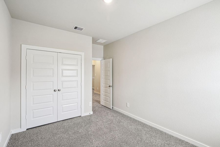 Spacious, unfurnished interior of a new home in Spring Brook Village - City Series, Houston (Image 33). Spacious, unfurnished interior of a new home in Spring Brook Village - City Series, Houston (Image 33).