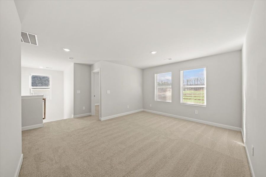 Spacious, unfurnished interior of a new home in The Farm at Wells Creek - Signature Collection, Gray Court (Image 18).