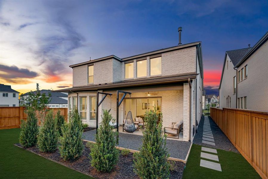 Exterior details and patio area of a home in Fields 50', Frisco (Image 3).