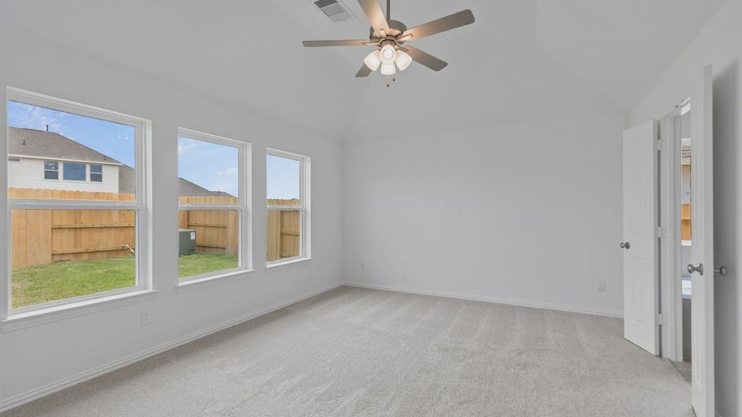 Furnished interior view inside a new home in Sunterra, Katy (Image 20).