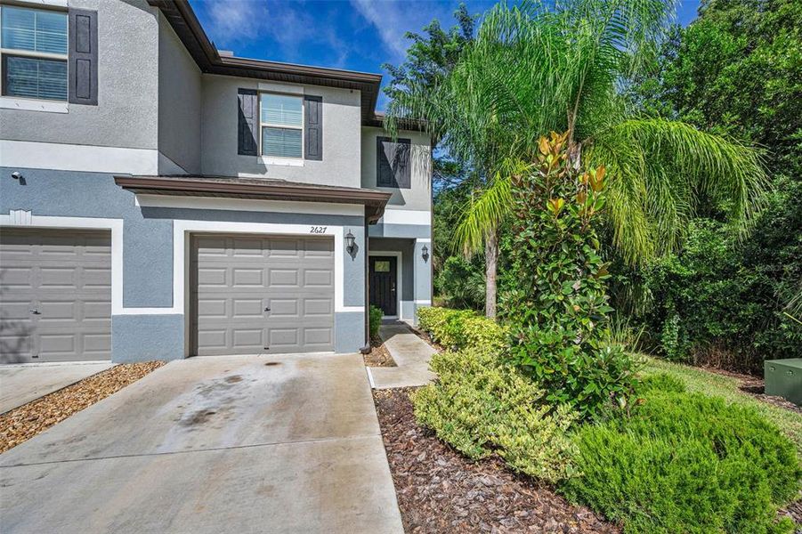 Front exterior of a new home in , Holiday, FL, highlighting curb appeal (Image 20).