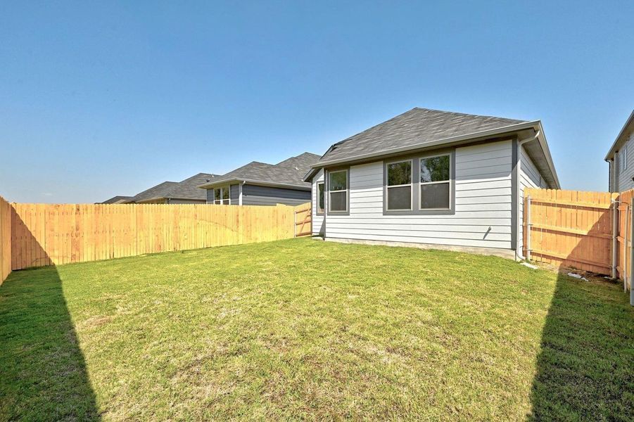 Exterior details and patio area of a home in Trinity Ranch, Elgin (Image 3).