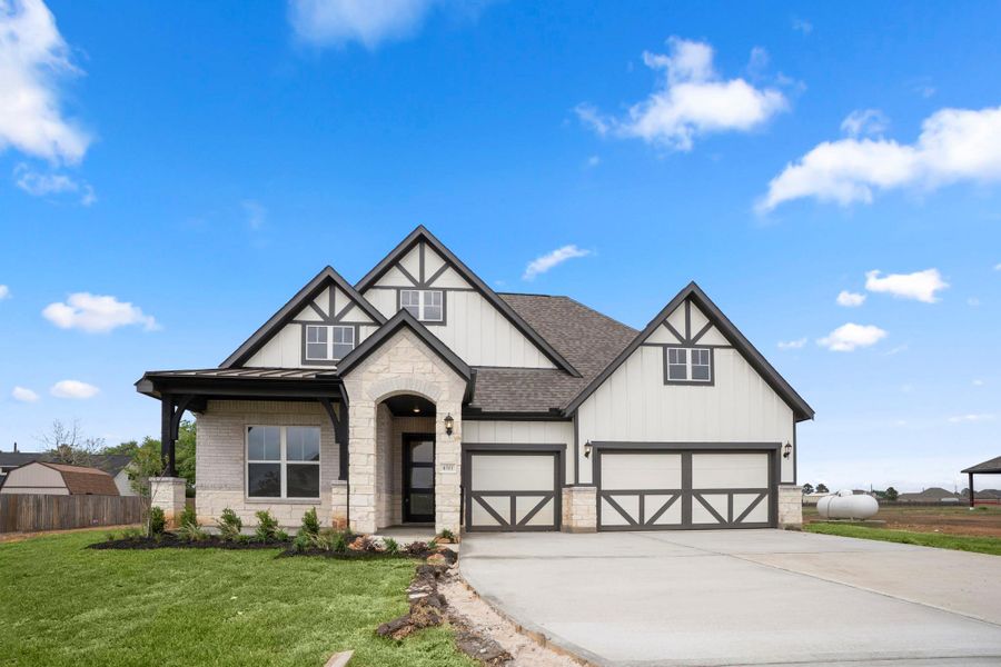 Front exterior of a new home in Magnolia Bend, Rosharon, TX, highlighting curb appeal (Image 29).