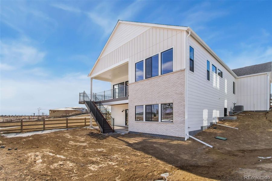 Exterior details and patio area of a home in Kitchel Lake at Serratoga Falls, Timnath (Image 3).