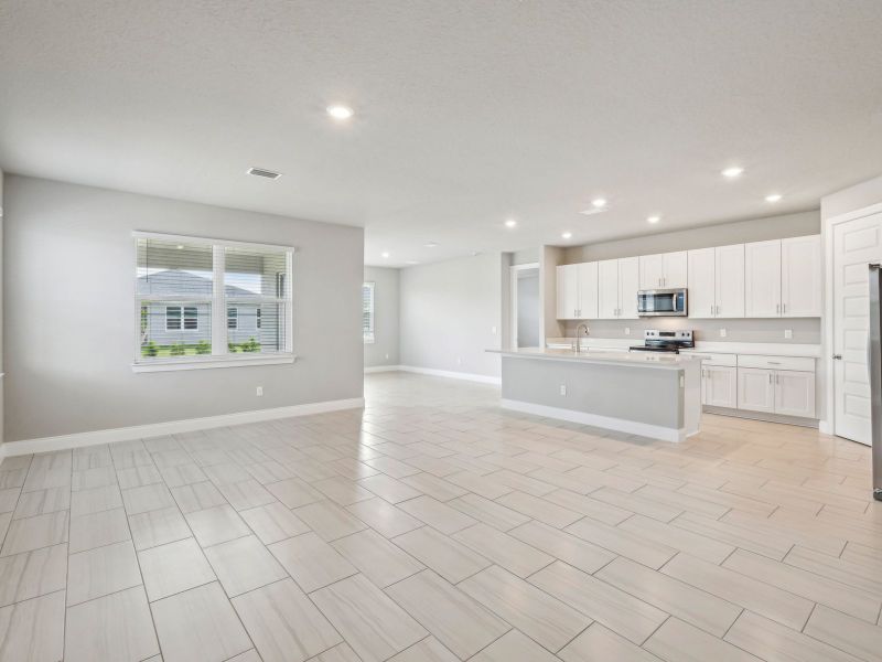 Spacious, unfurnished interior of a new home in Brystol at Wylder - Reserve Series, Port St. Lucie (Image 13).