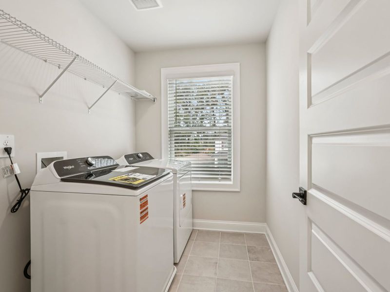 The Dallas Basement floorplan with the Upscale Rustic Linen interior package.