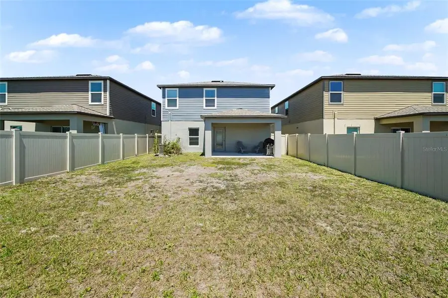 Exterior details and patio area of a home in Two Rivers, Zephyrhills (Image 3).