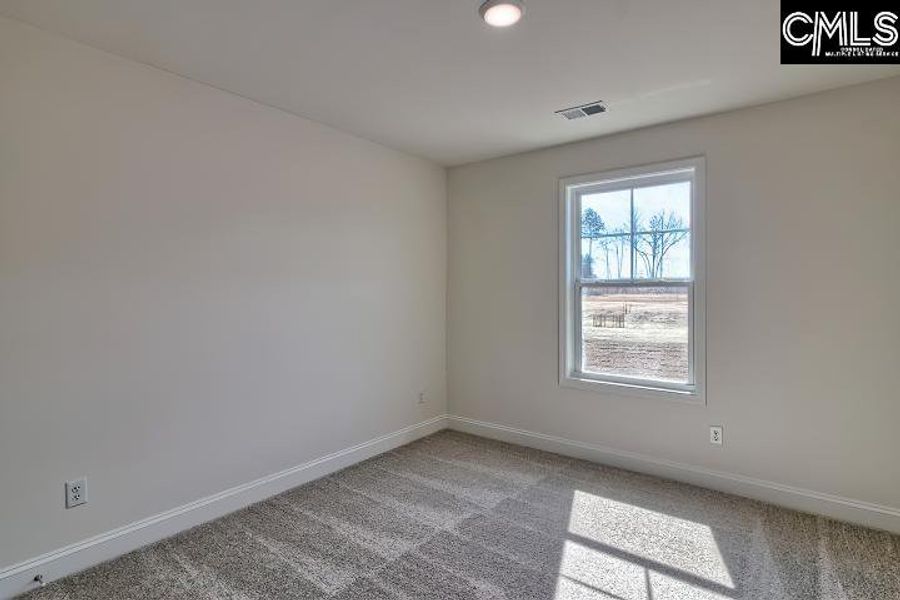 Spacious, unfurnished interior of a new home in Cottages at Roofs Pond, West Columbia (Image 39).